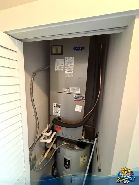 New air handler in a utility closet by Sunny Coast AC in South Florida