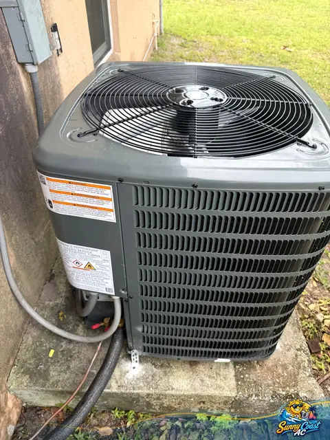 New condenser on its pad by Sunny Coast AC in South Florida