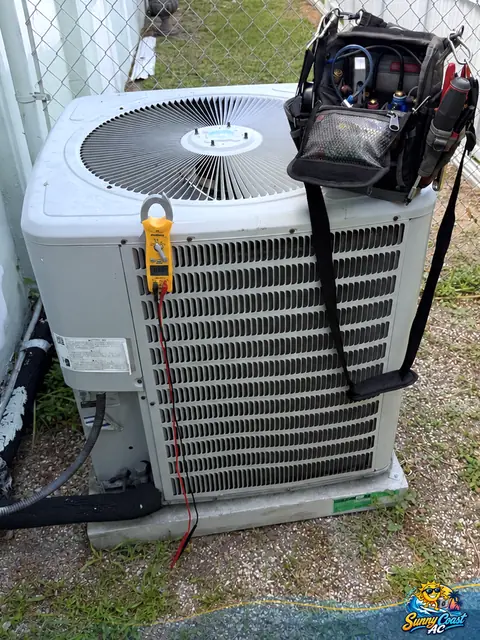 Testing an outdoor unit with a meter after a repair